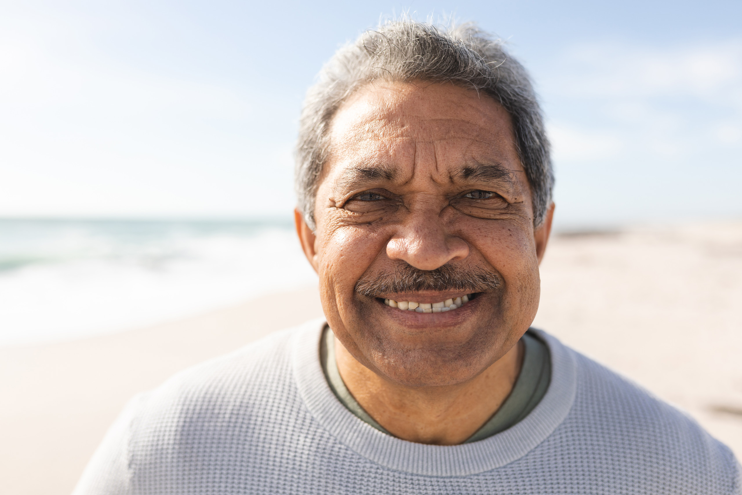 close-up-portrait-of-smiling-biracial-senior-man-w-2023-11-27-05-27-55-utc
